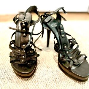 Stuart Weitzman platform heels. Strappy leather with wooden base.